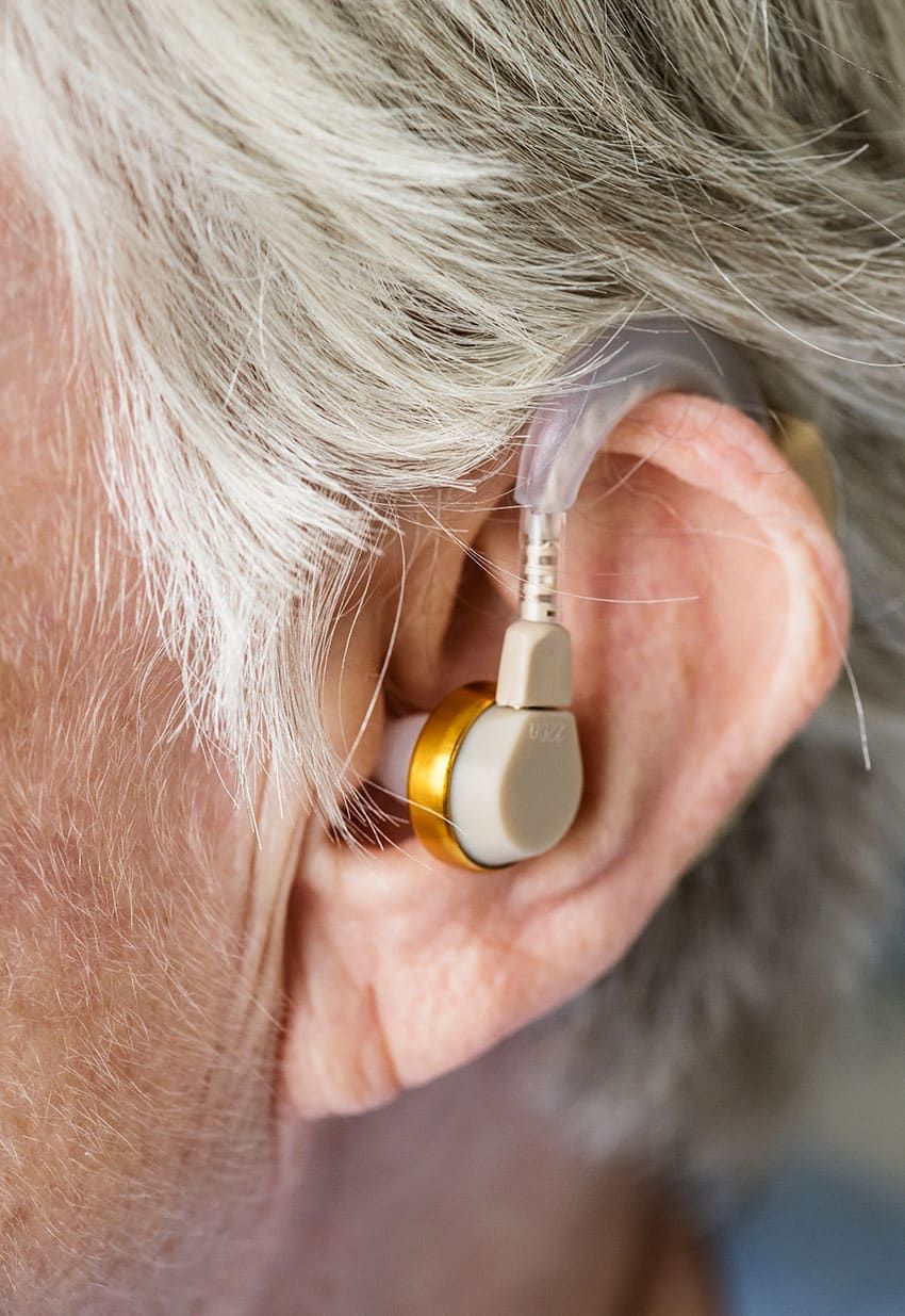 Elderly Woman With Hearing Aid